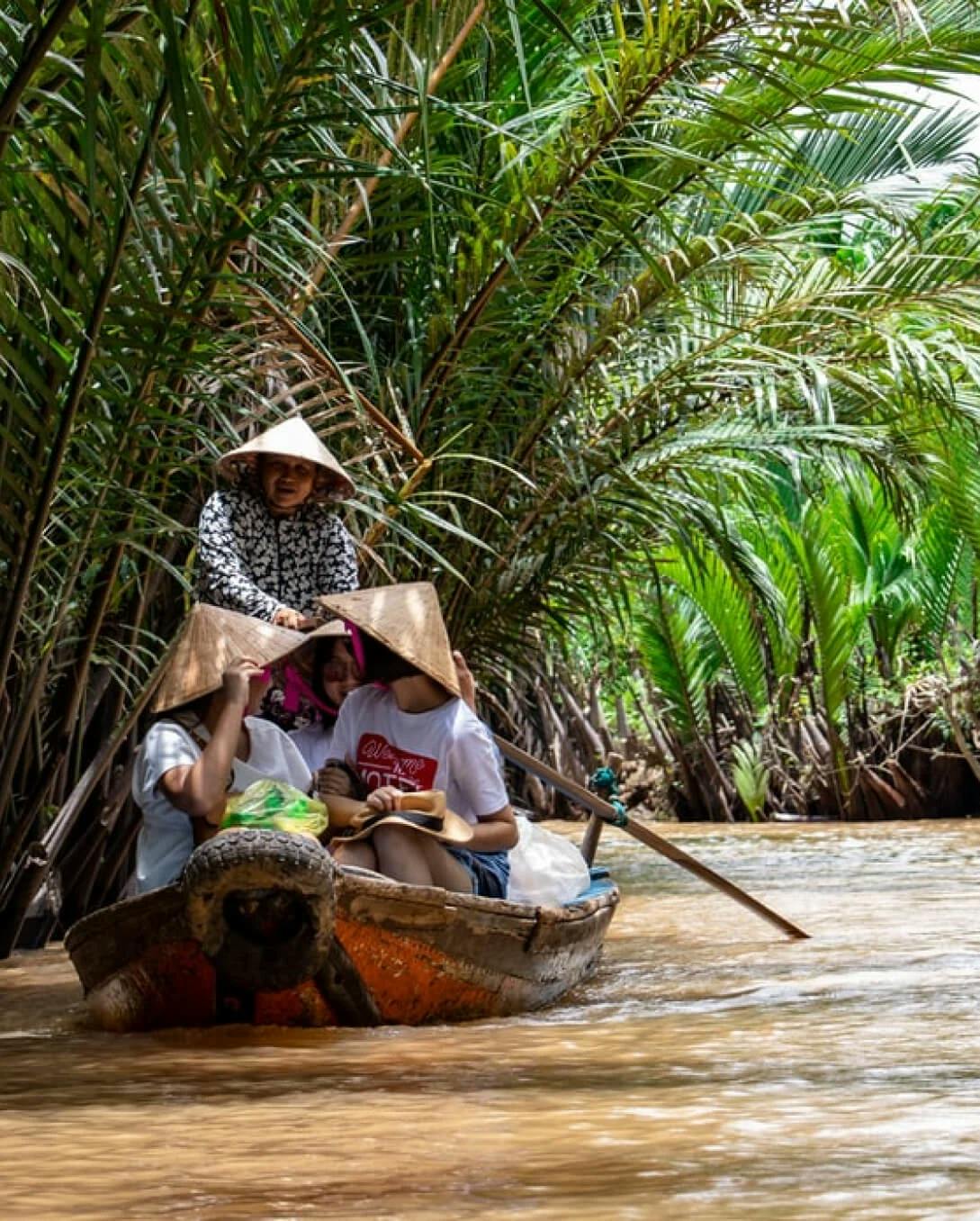 women in boat in vietnam