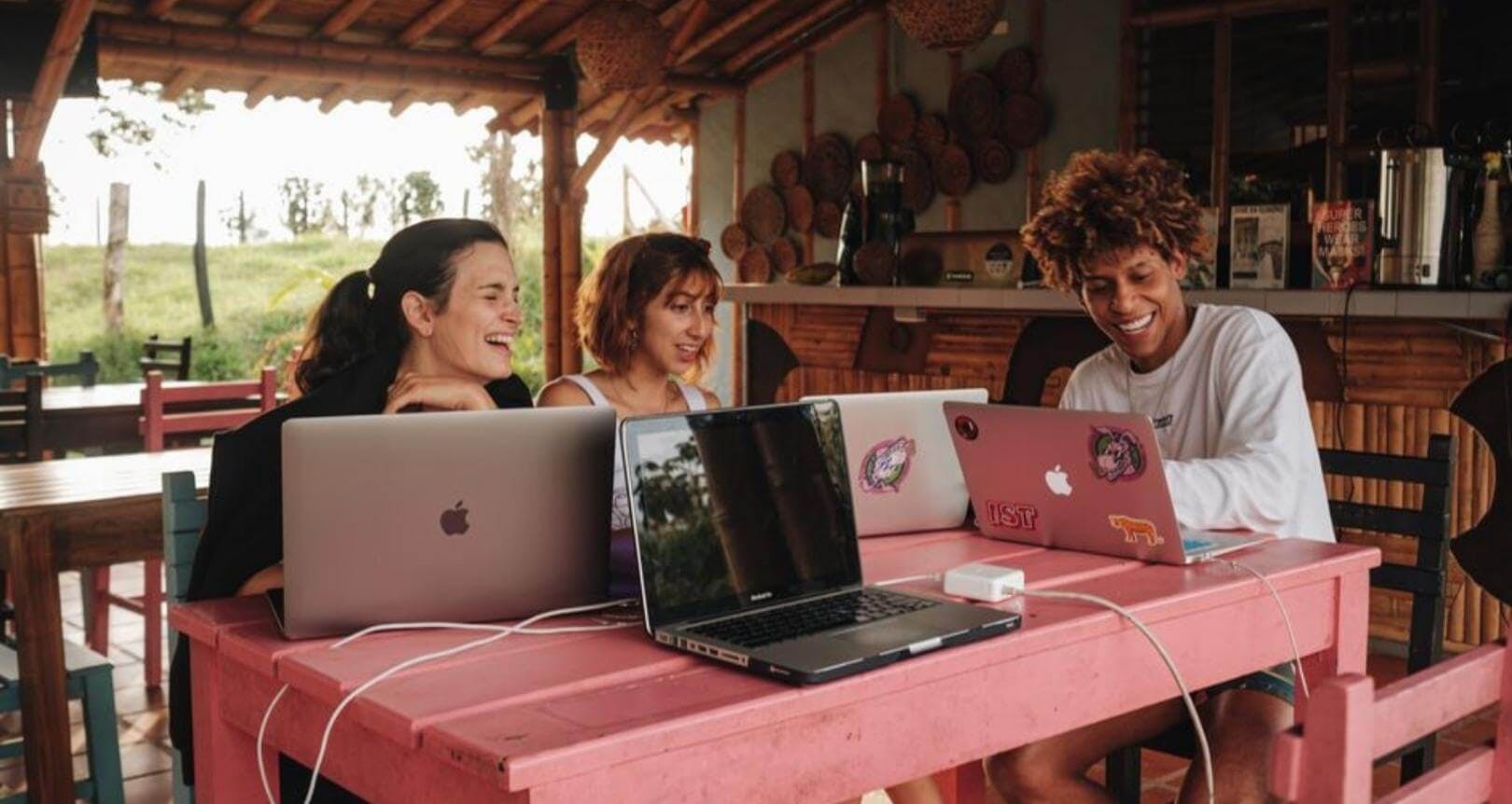 3 people working remotely from a hut in guatemala 