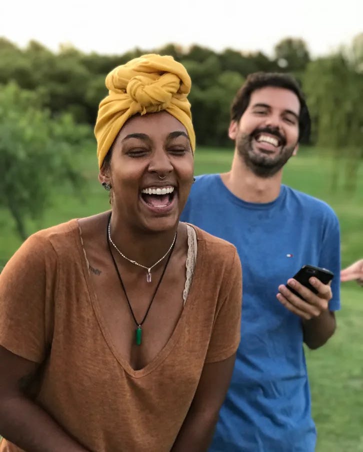 Two people laughing
